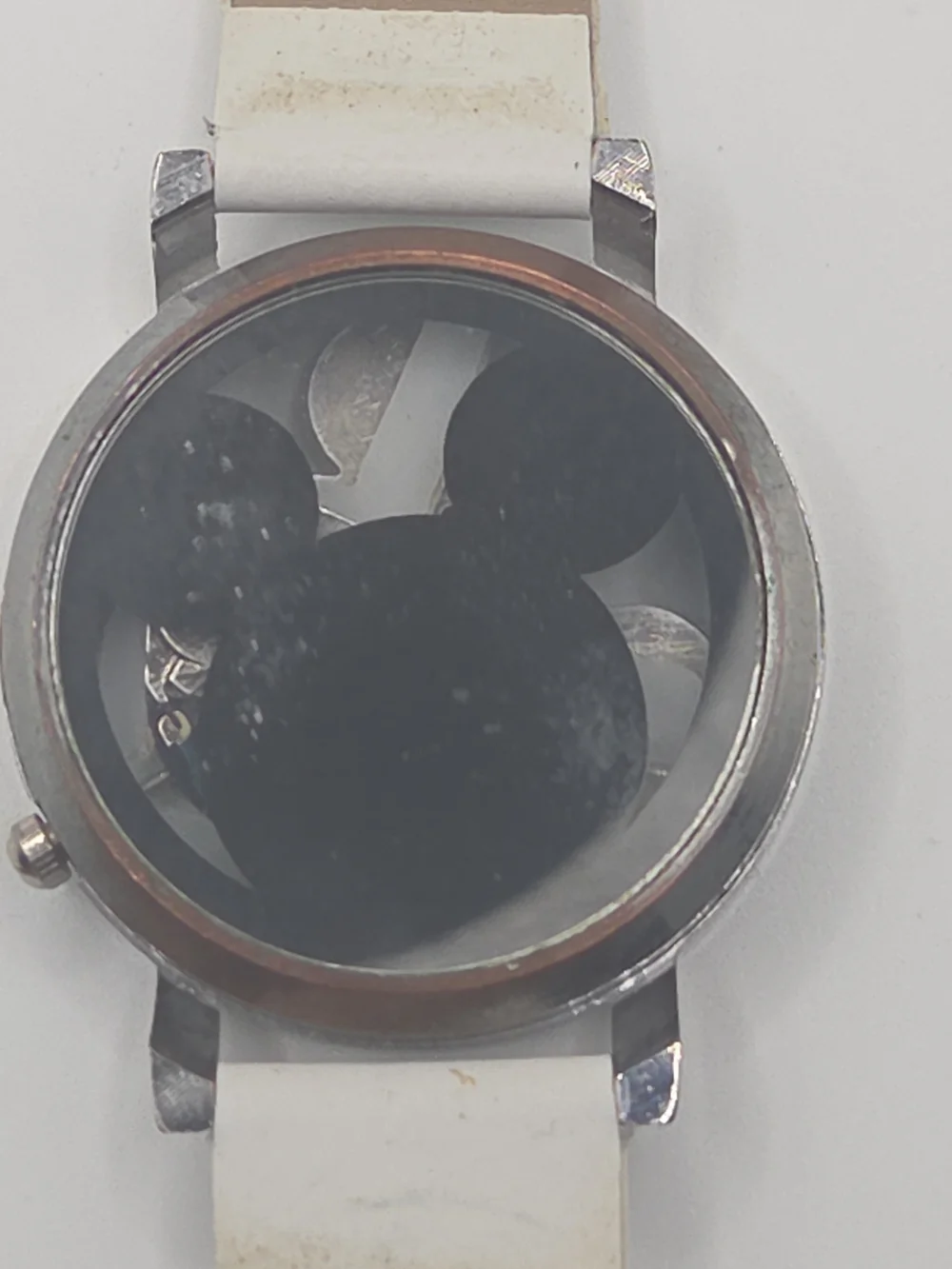 Vintage Disney Mickey Mouse wristwatch featuring a unique Mickey-shaped dial wit